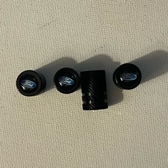Ford valve Stem caps in Black set of 4 NWT - Picture 1 of 4